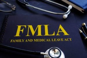 "Family and Medical Leave Act" written on a table.