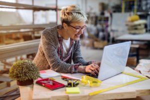 A woman working on her laptop.