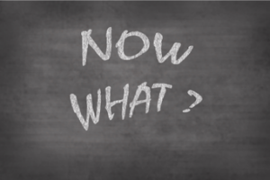 "Now What?" written in chalk.