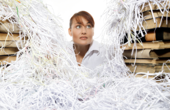 Woman with shredded employee records