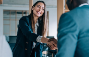 Recruiting manager shaking hands with candidate