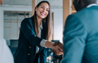 Recruiting manager shaking hands with candidate