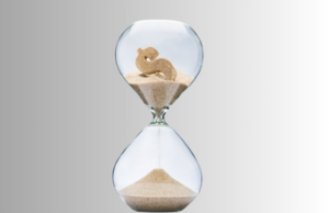 wage & hour hourglass with dollar sign made of sand