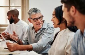 Multi-generational employees working together