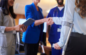 Worker with crutches returning to work