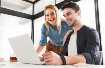 Co-workers looking at very interesting email message