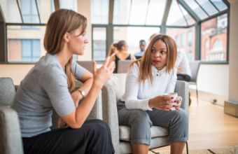 two women in conversation