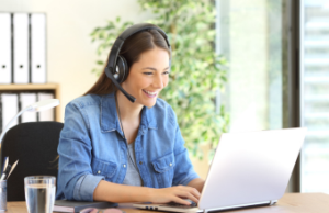 smiling woman doing online learning