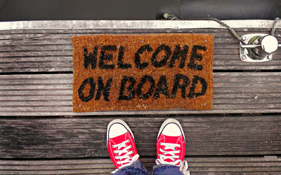 Welcome on board mat with red sneakers