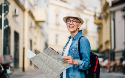 Retired person traveling new places with a map on hand