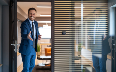 Salesman greeting client at his office's door
