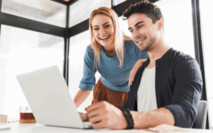 Co-workers looking at very interesting email message
