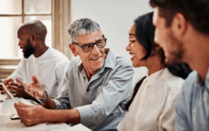 Multi-generational employees working together