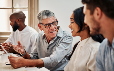 Multi-generational employees working together