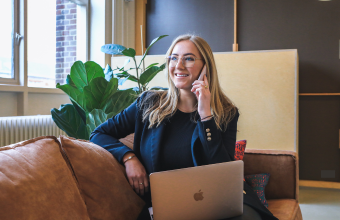 On phone with HR expert and on laptop