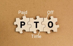 "PTO" spelled out on blocks."