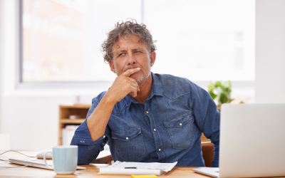 Man working on ownership information.