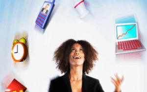 Woman juggling scheduling technology items