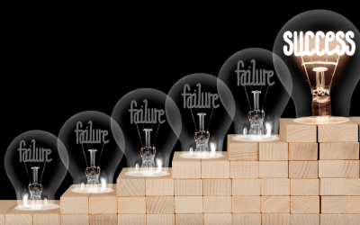 Light bulbs that say Failure and Success