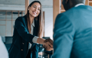 Recruiting manager shaking hands with candidate