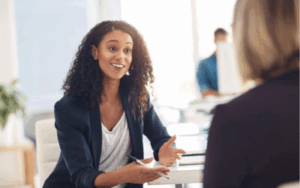 Two women discussing HR.