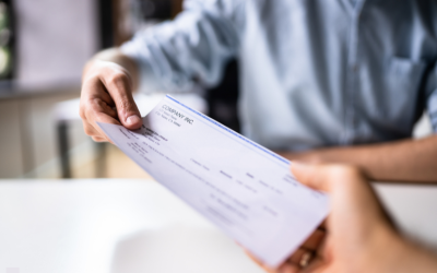 Person receiving an overtime check.