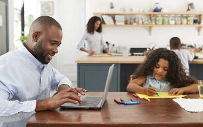 Man working from home with his family.