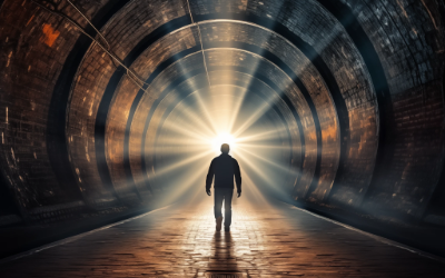 Man seeing the light at the end of the tunnel.