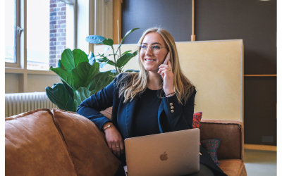 On phone with HR expert and on laptop