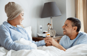 Man helping wife recuperate