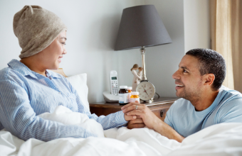 Man helping wife recuperate