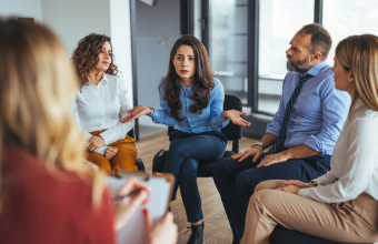 HR Manager explaining news to the group
