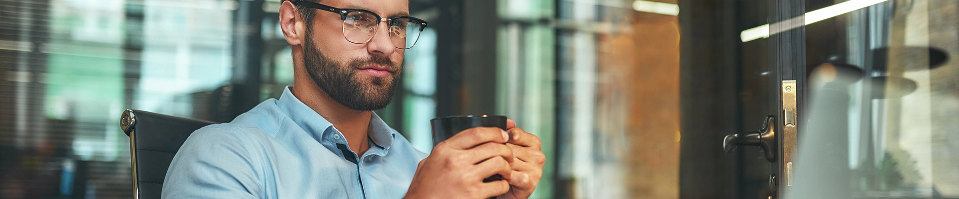 Man with coffee cup in hands