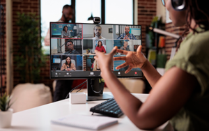 Computer monitor displaying remote meeting